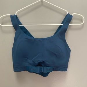 sports bra with lots of support and almost binder like: